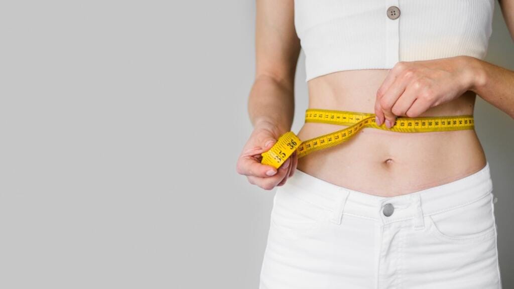 Woman's torso with measuring tape. Wegovy Injections in Huddersfield at Park View Pharmacy.